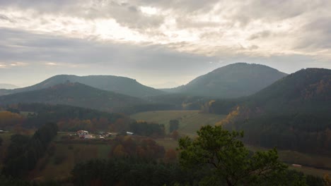 4k time lapse of beautiful german landscape with sun braking through clouds