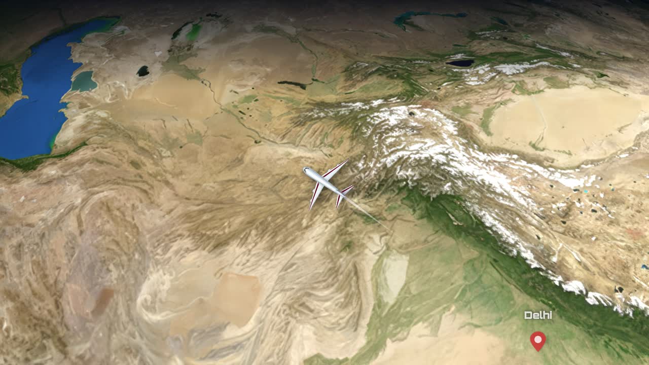 A digital animation tracks an airplane flying from Delhi to Amsterdam across a realistic globe