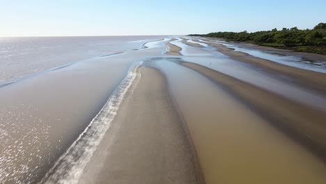 fast forward aerial shot of sand banks by coast of rio de la plata