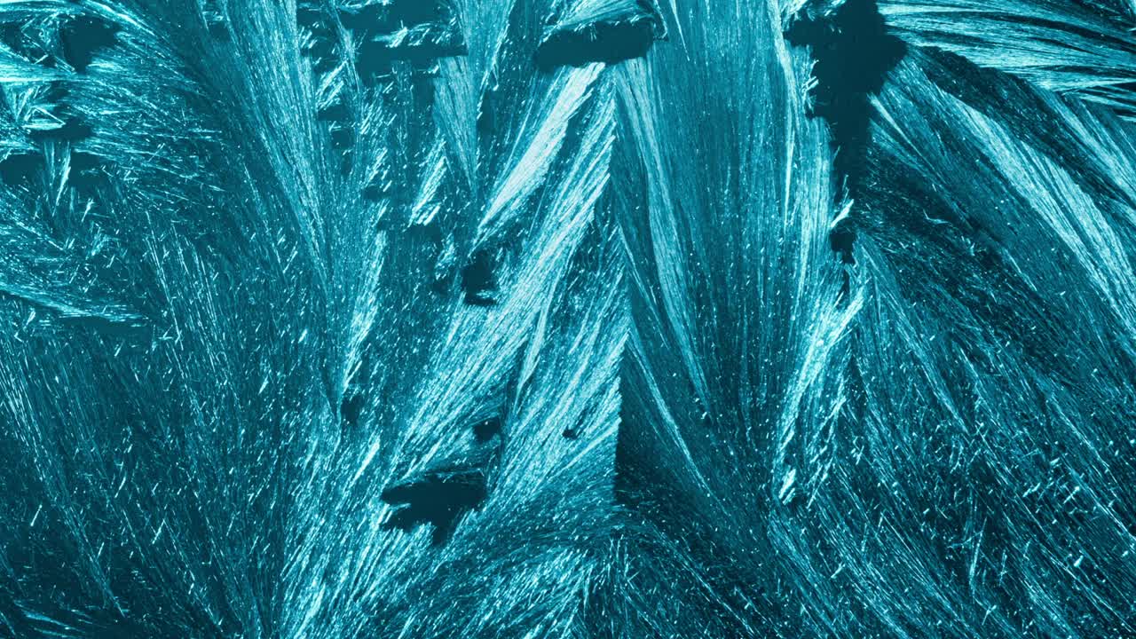 fondo de invierno: patrón de escarcha en el cristal.