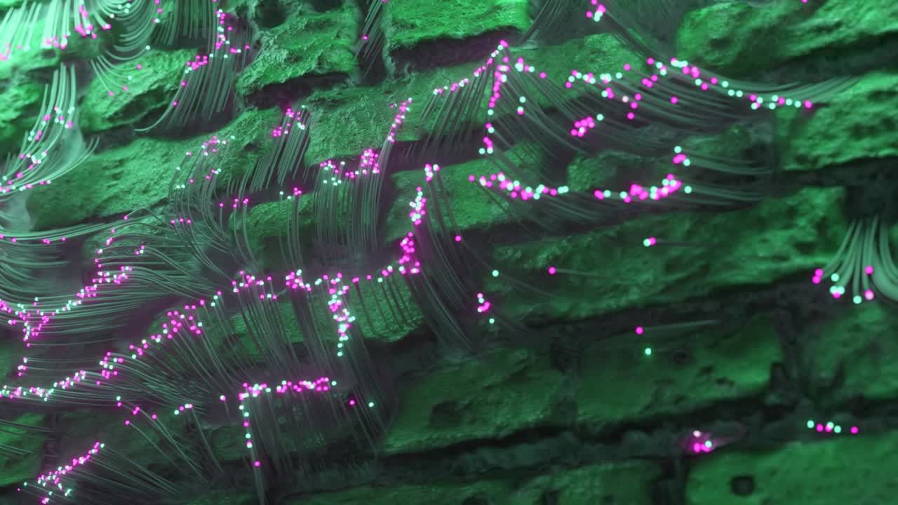 광섬유는 벽돌 사이에 나타나고 벽돌 벽을 따라 퍼집니다. 추상적인 기술 배경.