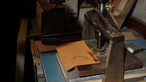 leatherworking process with metal press