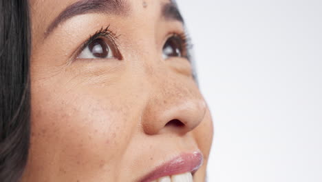 thinking, happy and asian woman in face closeup