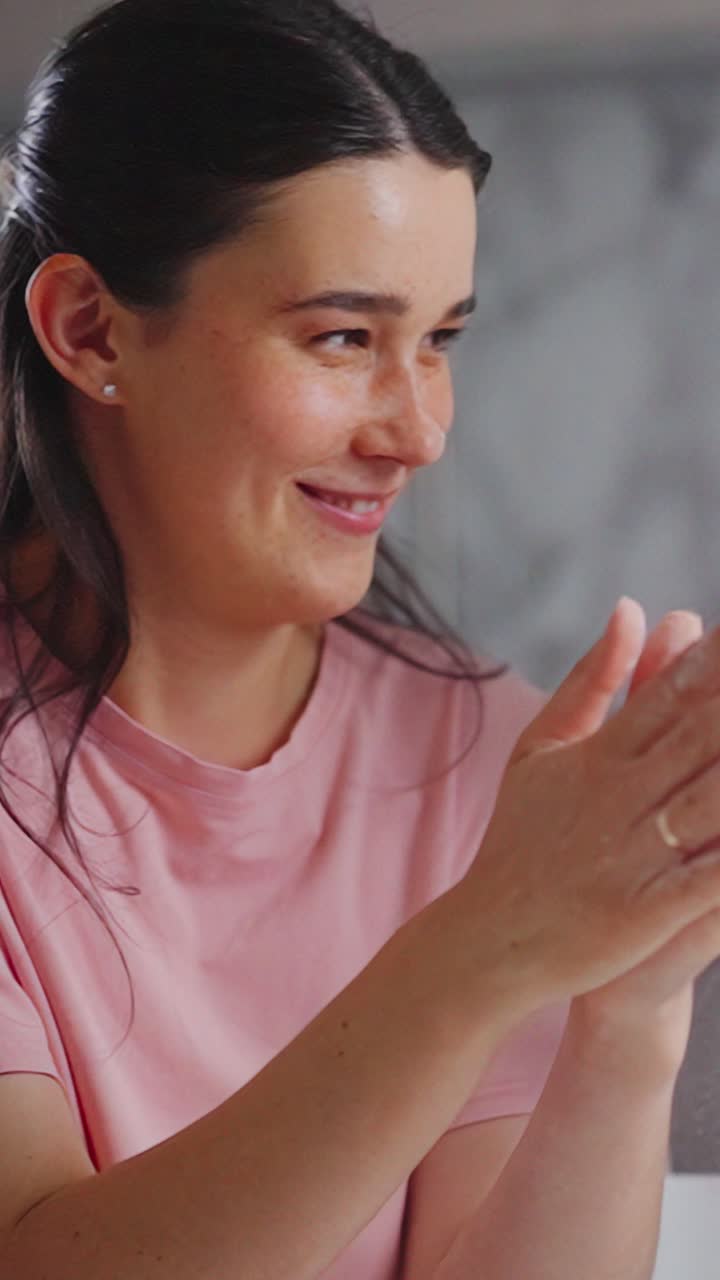 A Joyful Moment of Cooking: A Person Experiencing Delight While Preparing Ingredients in a Bright Kitchen Environment