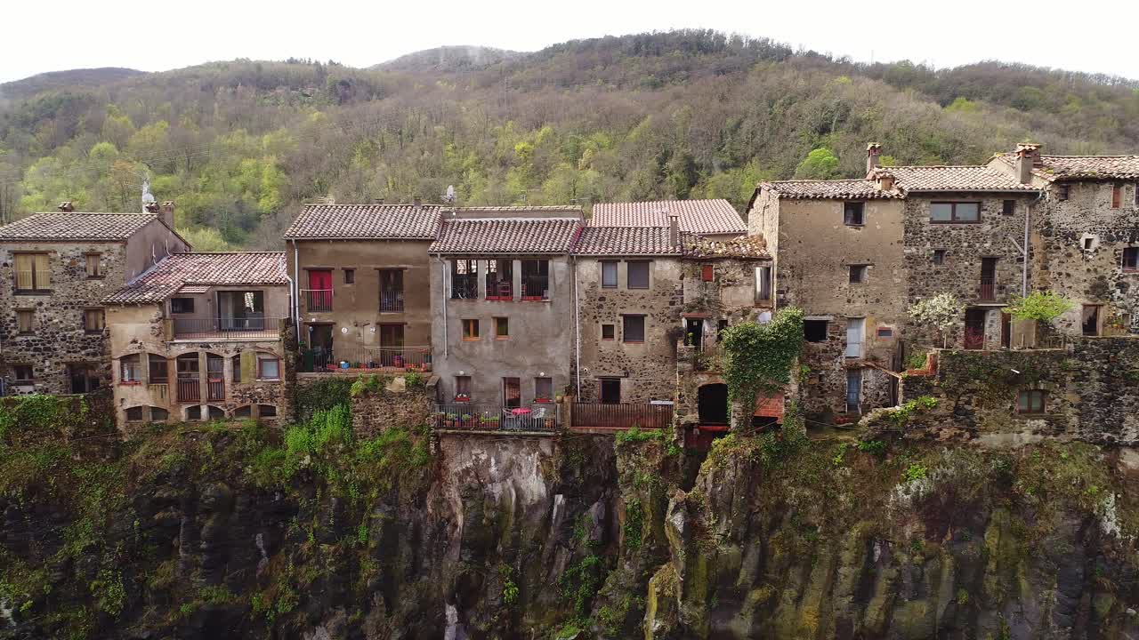 Castellfollit de la Roca, stunning stone architecture, lush natural surroundings