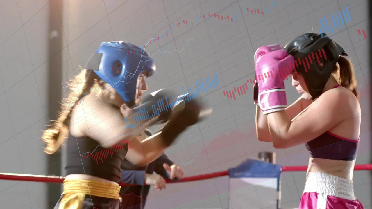Due pugilesse che fanno sparring sul ring dopo essersi studiate a vicenda, scambiandosi jab per allenamento.