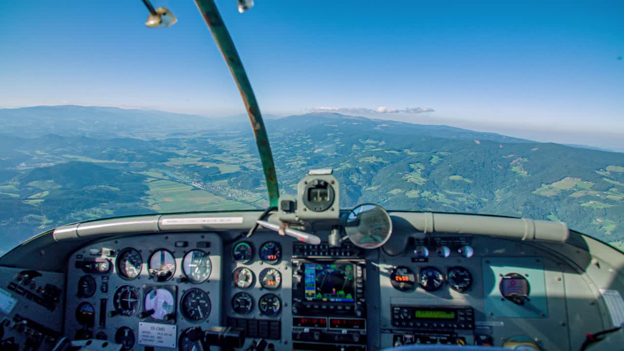 Pilot POV Inside Cockpit. Hand Steers Joystick To Fly Aeroplane