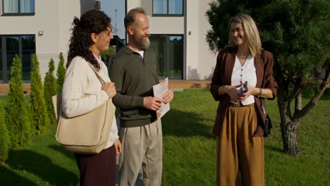 group viewing a modern house