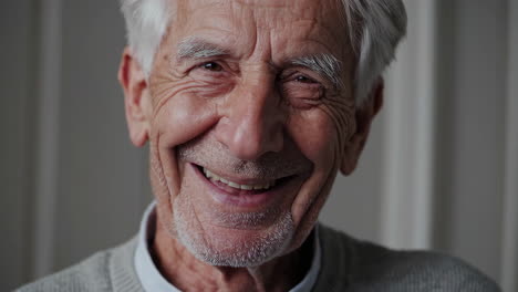 close-up portraits of a smiling elderly man