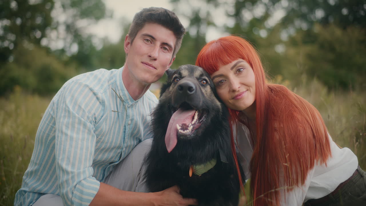 Couple with their German Shepherd dog