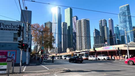 busy street with buildings and vehicles