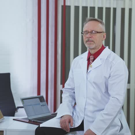doctor is working in his medical office