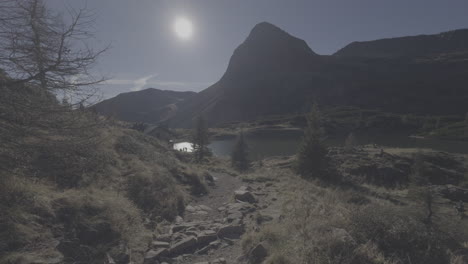 mountain hiking trail to alpine lake