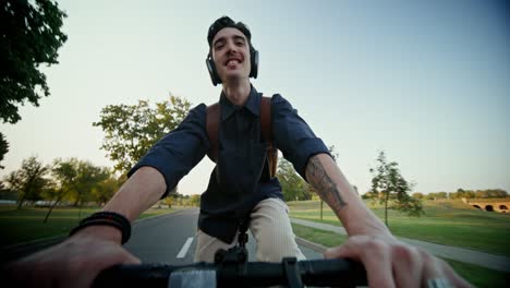 man cycling in park