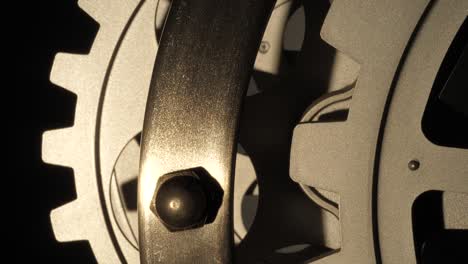close up cogwheels of an industrial looking clock