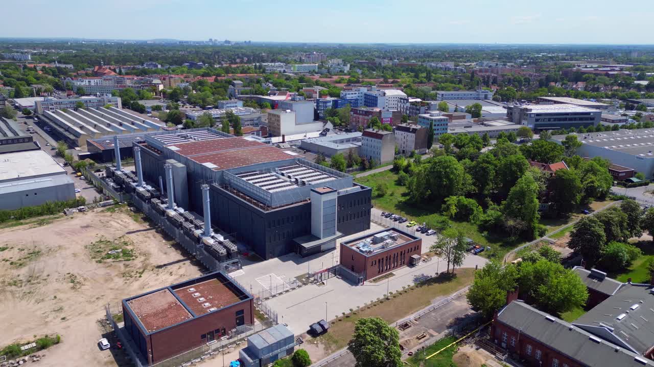 Big Data cloud storage, Industrial air con system cooling Ai farm in a large data center in berlin Europe. Unique aerial view flight wide orbit overview drone