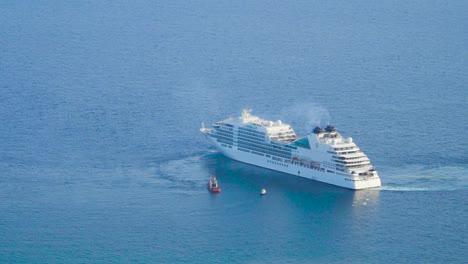 Cruise-Ship-Maneuvers-to-Leave-Harbour-in-Kavala-Greece,-Vessel-Maneuvering-Move