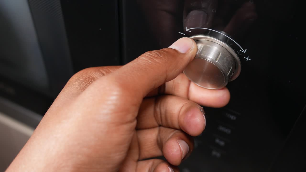 Hand Adjusting Microwave Oven Knob