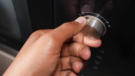 Hand Adjusting Microwave Oven Knob