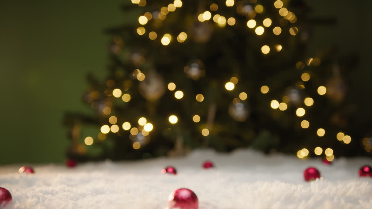 Gift Packages Fall On A White Carpet At Christmas Celebration