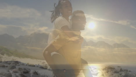 couple riding piggyback and smiling over rocky coastal travel scene, with animated sun icon gliding