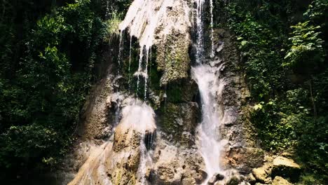 waterfall,-beautiful-lush-jungle,-tropical-rainforest,-push-in-drone-shot