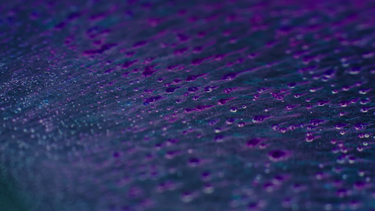 Colourful, organic, liquids macro shots buzzing and flowing