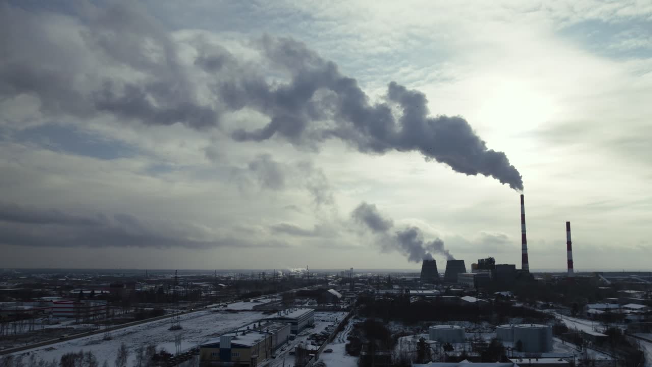 Industrial Power Plant in a Snowy Landscape