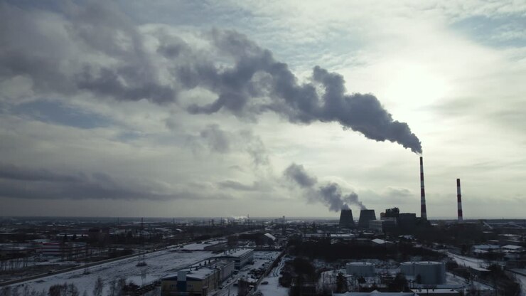 Industrial Power Plant in a Snowy Landscape