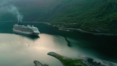 huge cruise ship passing through the norway flam