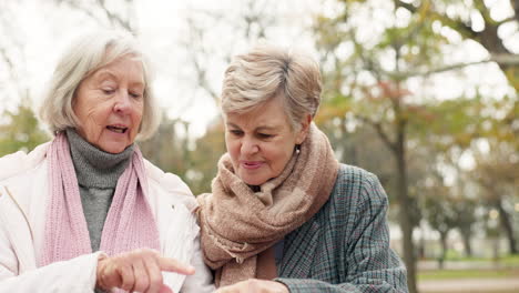 Old-people,-map-or-senior-women-hiking-in-a-park