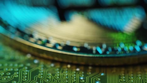 bitcoin on circuit board, rack focus, extreme close up motion, depth of field