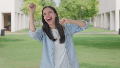 happy indian girl dancing and enjoying