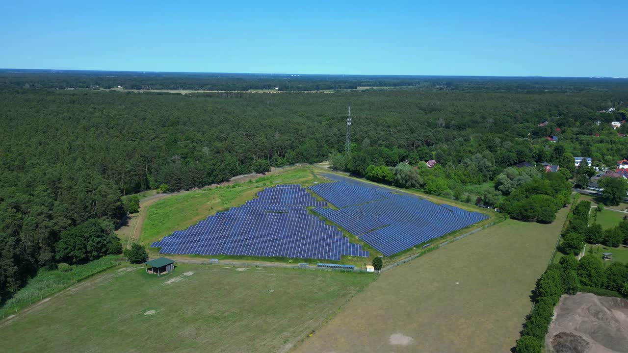 solar panels on Hill transforming a waste site into a source of renewable energy, a sustainable solution for the future. speed ramp hyper motion time lapse Fabulous aerial view flight ascending drone