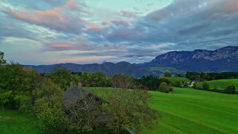 Beautiful-aerial-view-of-a-village-near-the-Attersee-in-the-Austrian-Alps---Austrian-mountain-summer-aerial-footage