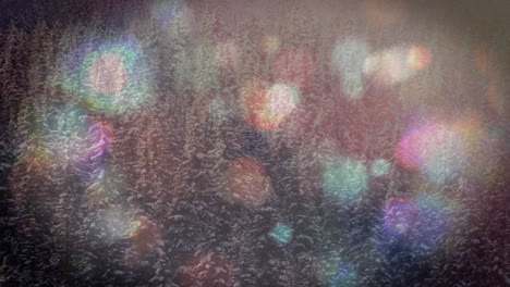 animation of multiple flickering spots of light over winter scenery in forest