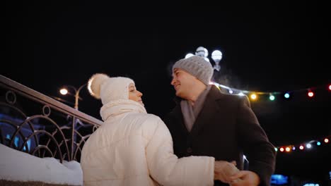 couple enjoying a winter night stroll