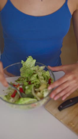 woman eating healthy salad