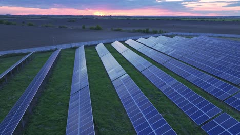 aerial view of hundreds solar energy modules or panels rows