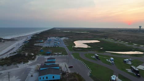 aerial view of padre balli park near bob hall pier at dusk in corpus christi, texas, usa