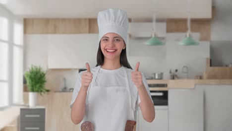 happy indian female professional chef showing thumbs up