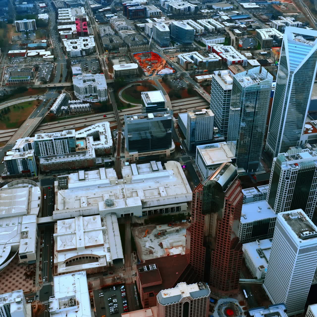 Lively American city at daytime. Top view on the downtown of modern Charlotte, NC, USA