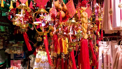 colorful hanging ornaments in a bustling market