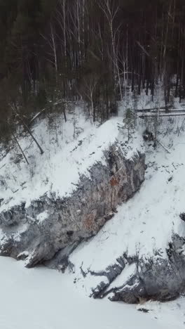 winter landscape with snow-covered rocks and trees