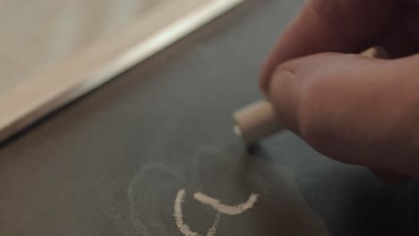 writing abc on a blackboard