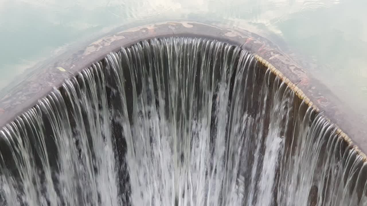 Waterfall flowing from the dam. file 2