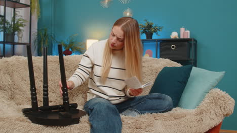 caucasian woman trying to understand table assembly instructions confused and frustrated at home