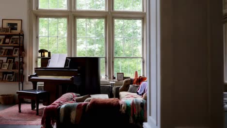 cozy living room with piano and vintage decor