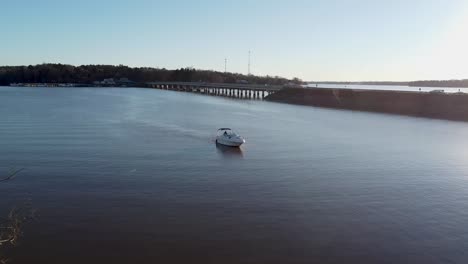 Boat-coming-across-the-lake-at-sunset.