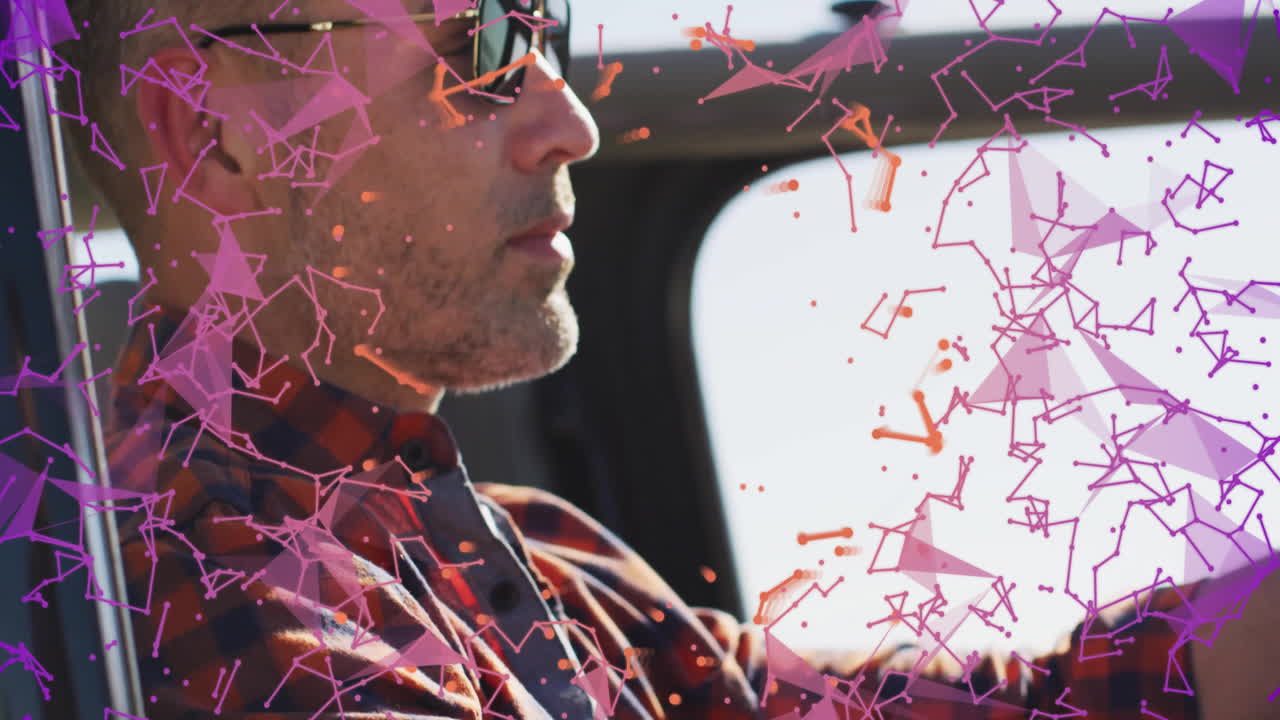 Man driving car with abstract purple and orange geometric animation overlay